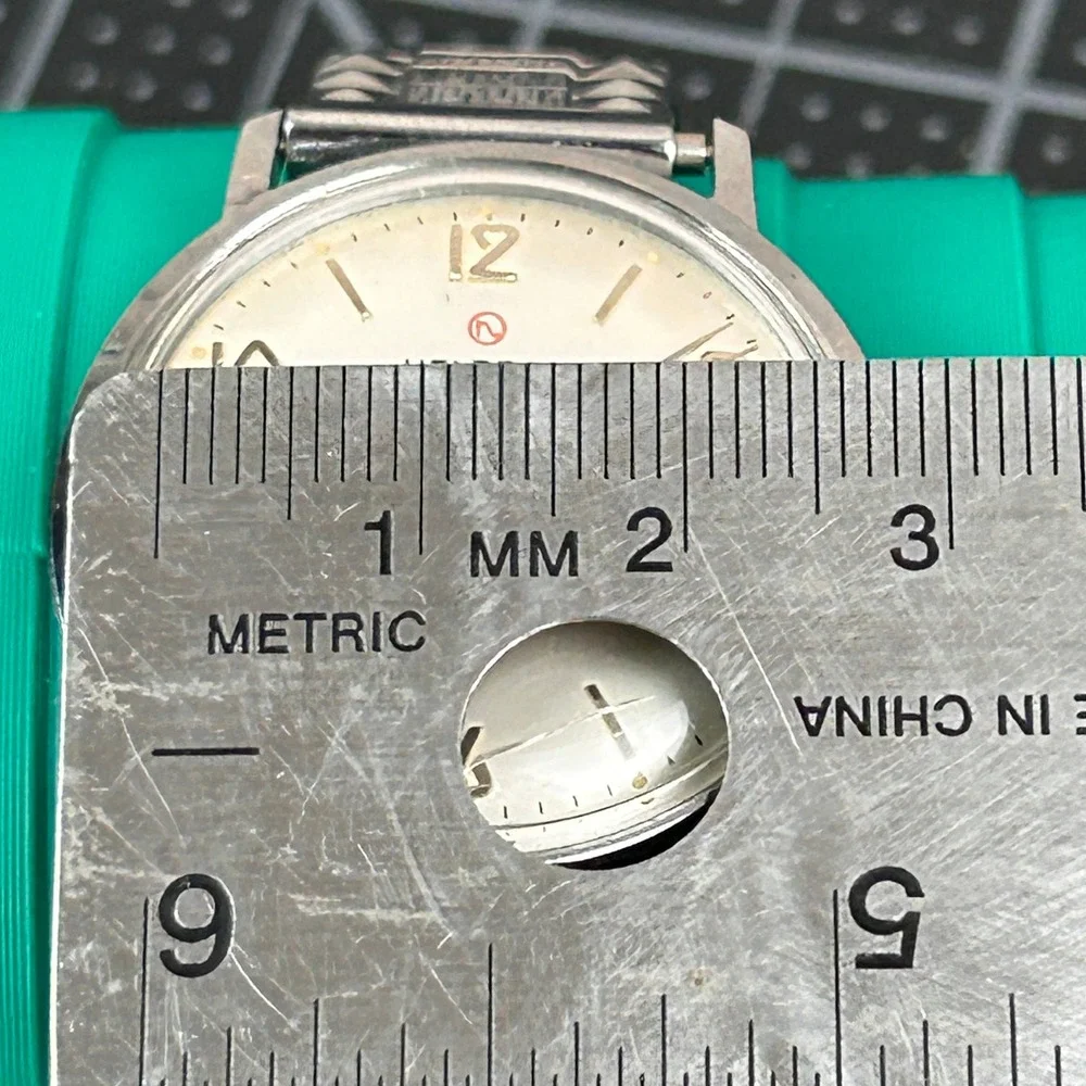 Vintage Helbros Invincible Watch Silver Tone Date Manual Wind‎ Swiss Made 34mm